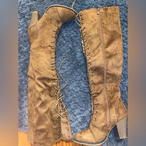 Brown suede lace up boots . Worn a few times .. good condition